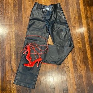 Asymmetrical closure faux leather pant